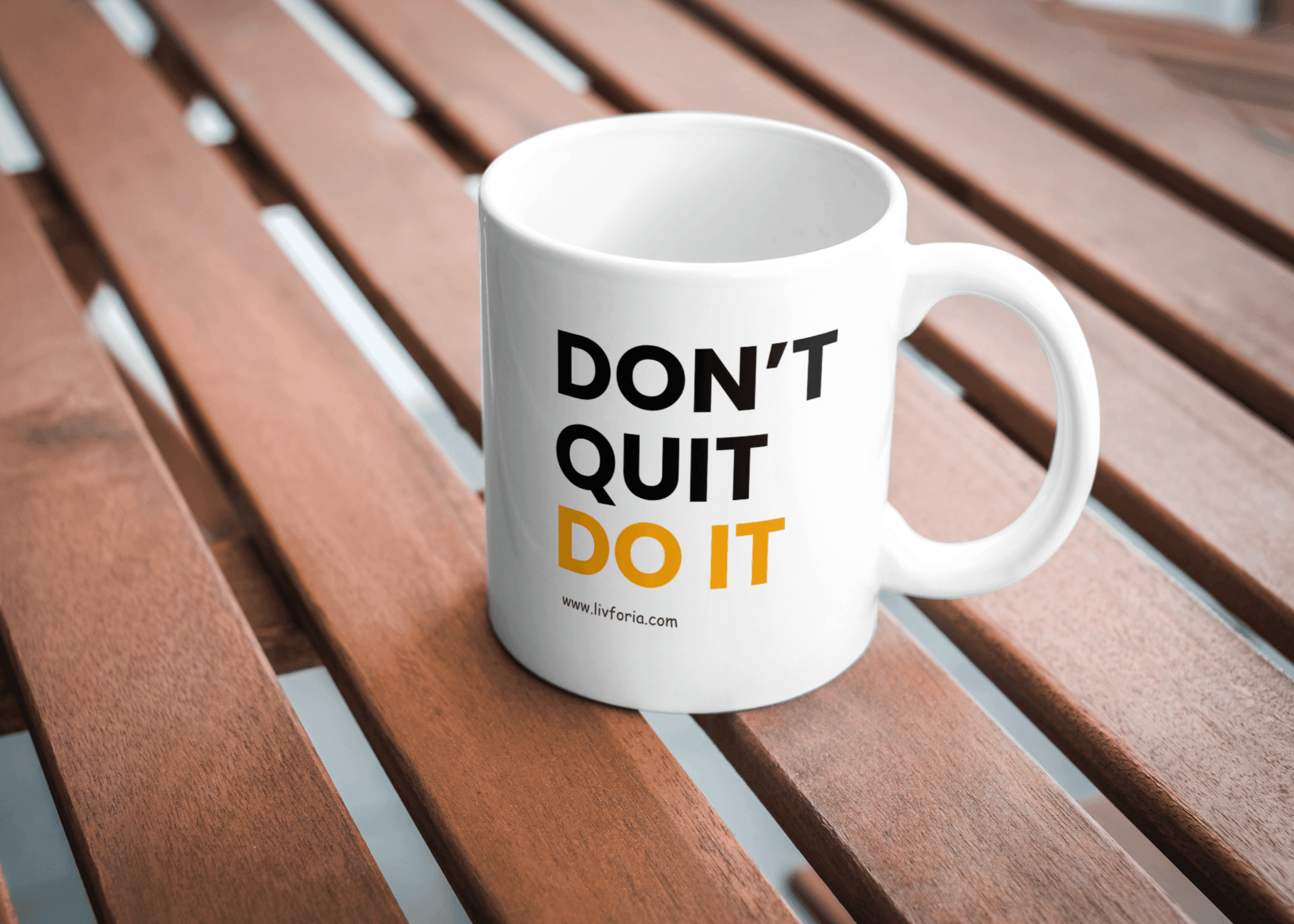 White ceramic mug with bold black text reading 