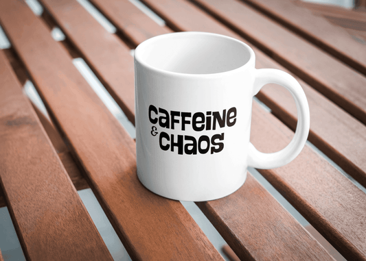 White ceramic mug with bold black text "Caffeine & Chaos" – funny and relatable coffee mug from Livforia for caffeine addicts