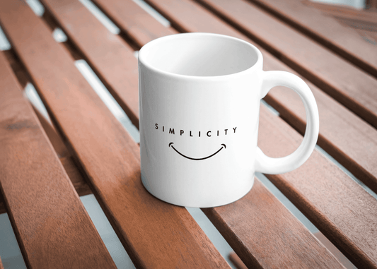 White ceramic mug with the word "Simplicity" in minimalist black text – Livforia’s aesthetic quote mug for peaceful mornings